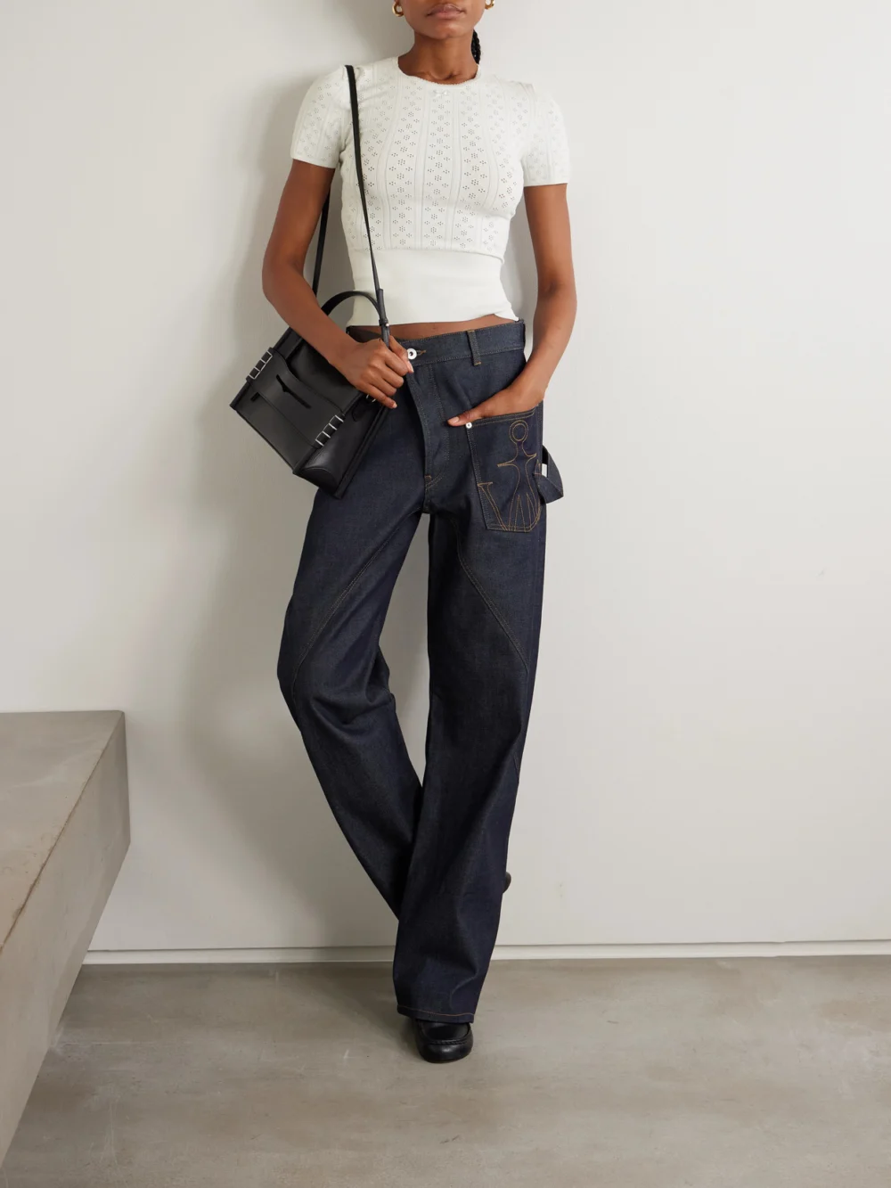 JW Anderson Bow-detailed Recycled Pointelle-knit T-shirt, worn by a model