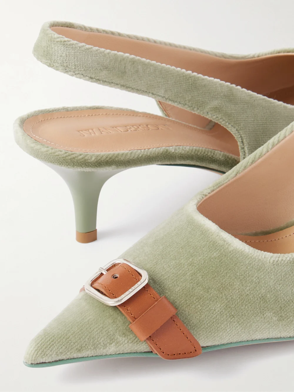 Close-up detail of the JW Anderson Buckle-embellished Leather-trimmed Velvet Slingback Pumps