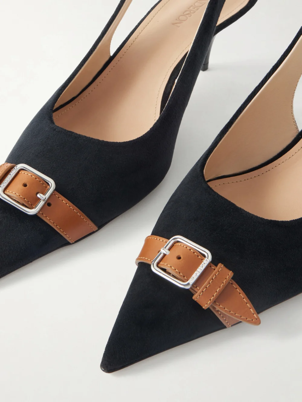 Close-up detail of the JW Anderson Buckled Leather-trimmed Velvet Slingback Pumps