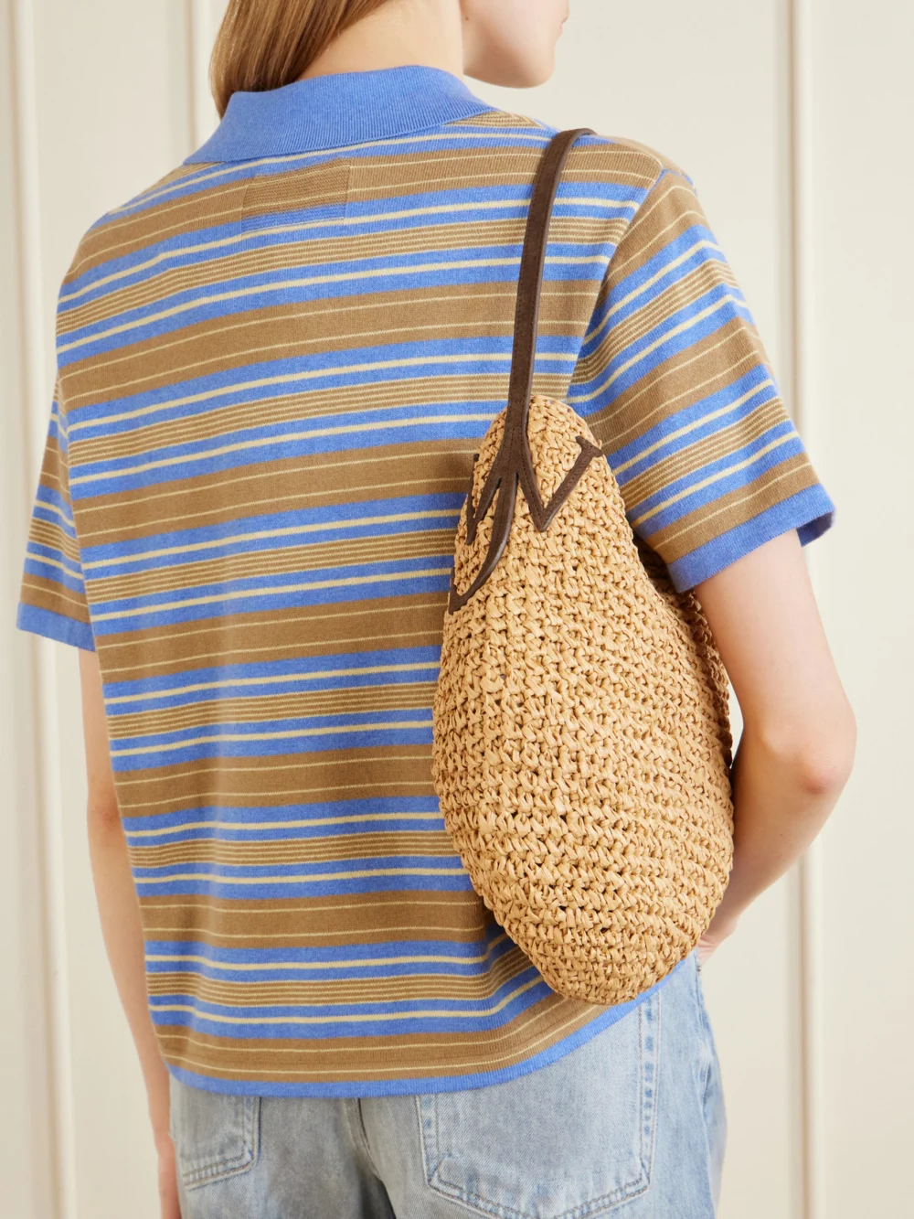 JW Anderson Bulb Leather-trimmed Raffia Shoulder Bag, styled view