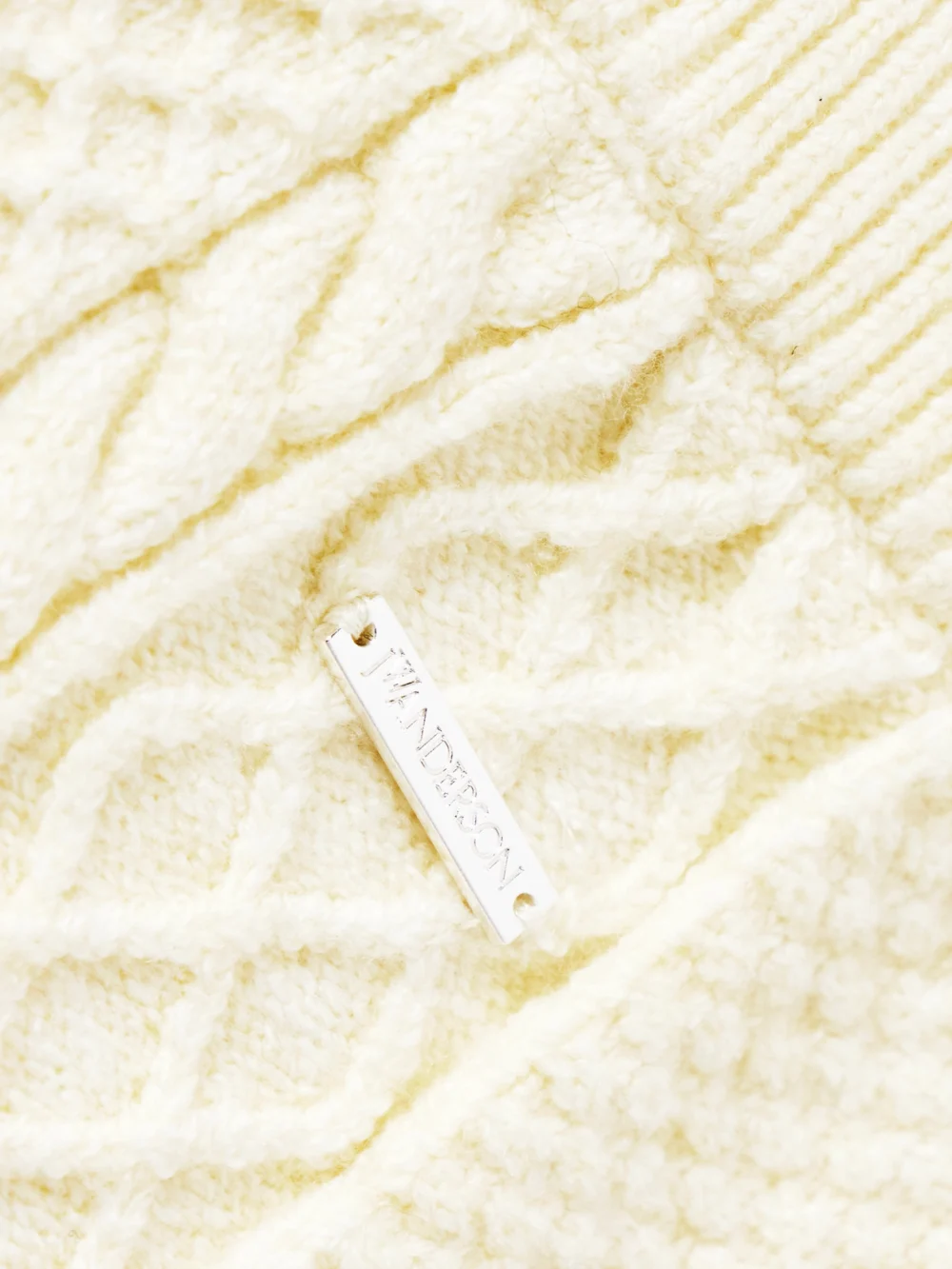 Close-up detail of the JW Anderson Cable-knit Organic Cotton-blend Skirt