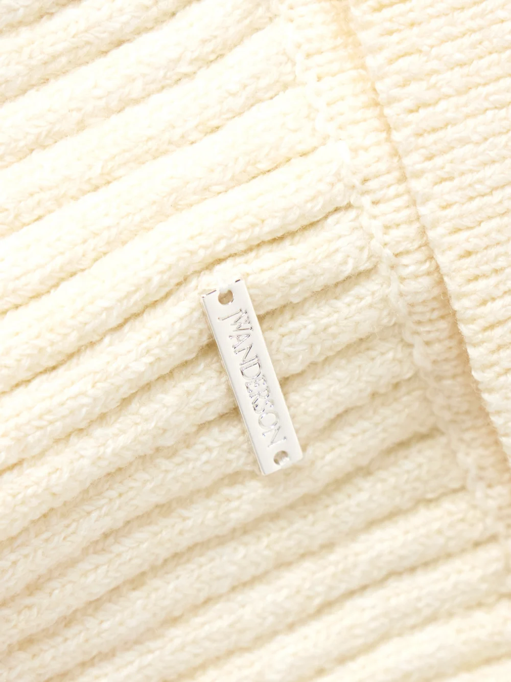 Close-up detail of the JW Anderson Cable-knit Polo Shirt