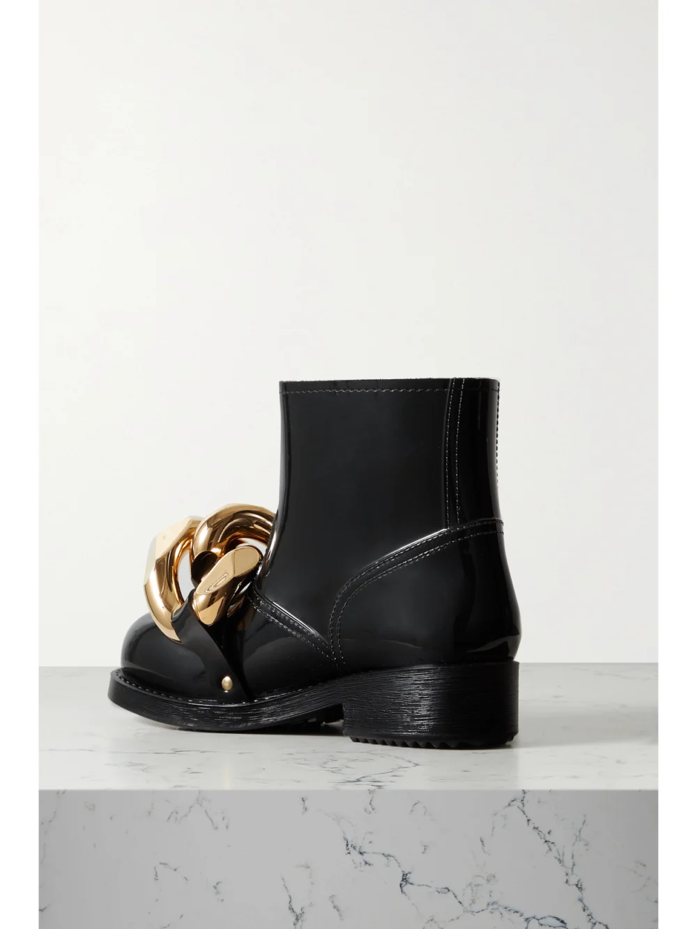 Back view of the JW Anderson Chain-embellished Glossed-rubber Rain Boots