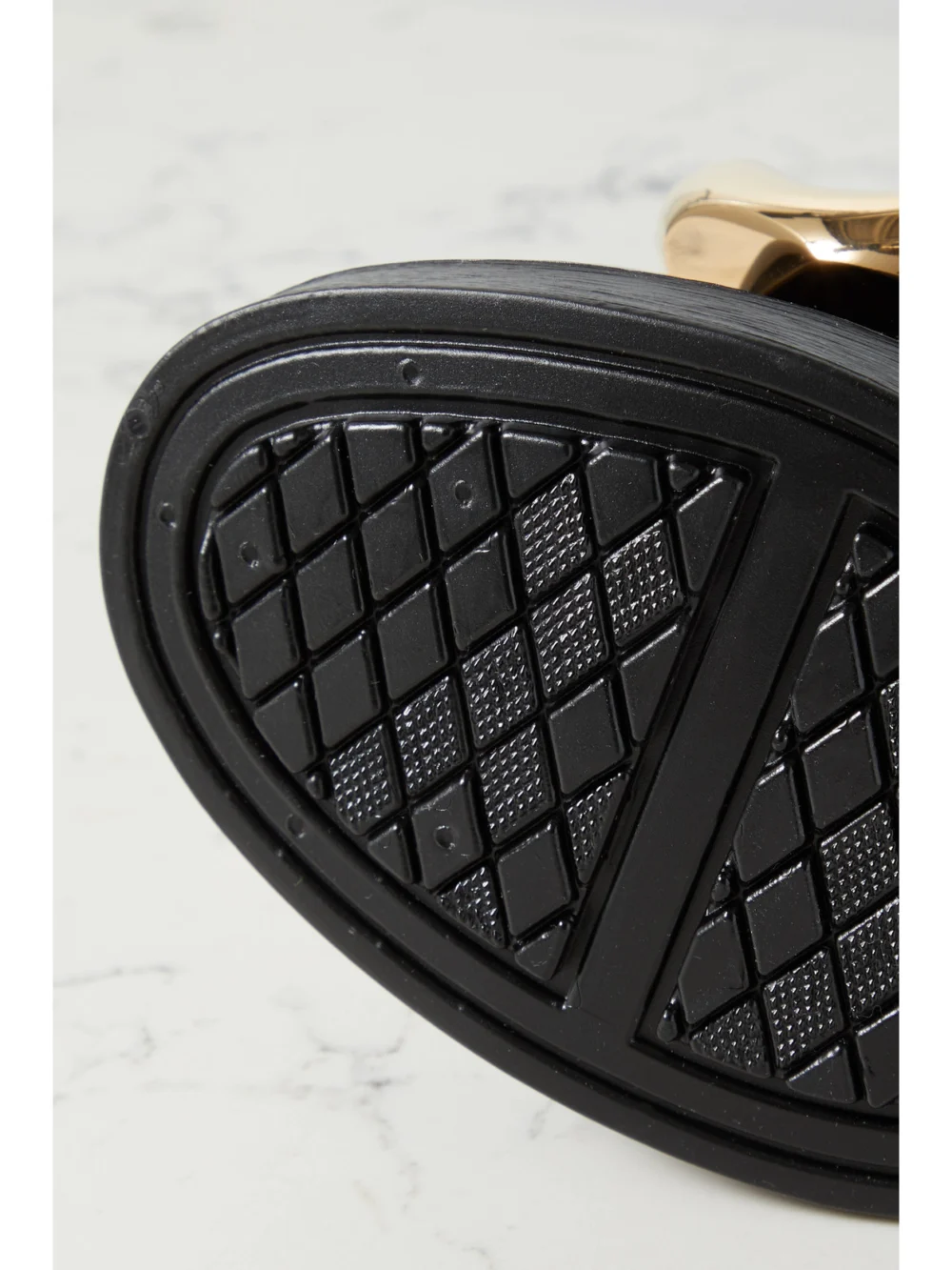 Close-up detail of the JW Anderson Chain-embellished Glossed-rubber Rain Boots