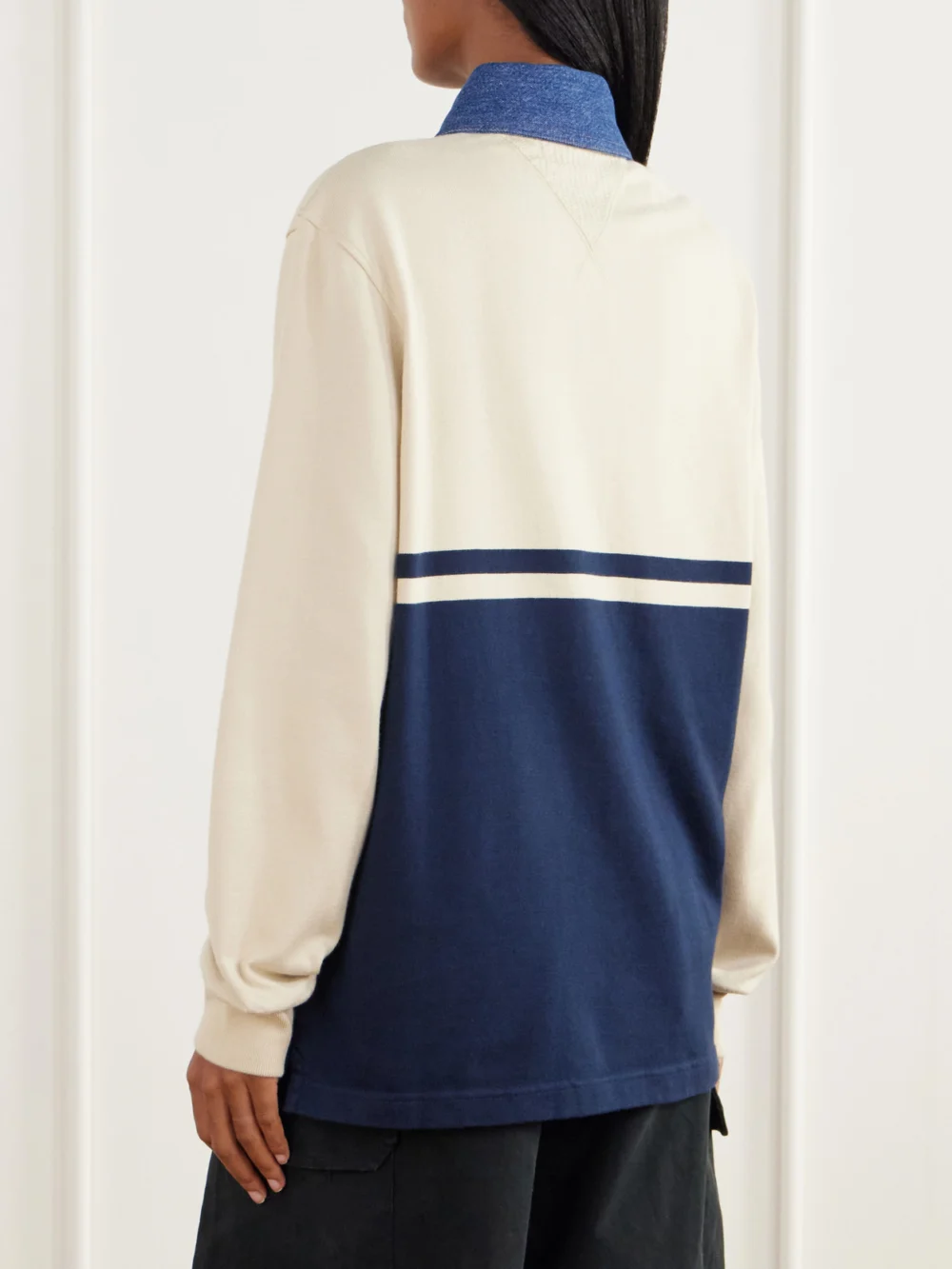 Back view of the JW Anderson Contrast Collar Embroidered Striped Cotton-jersey Polo Shirt