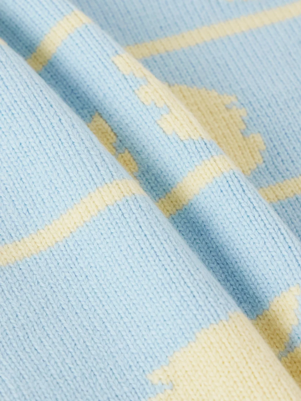 Close-up detail of the JW Anderson Crockery Intarsia-knit Wool Sweater