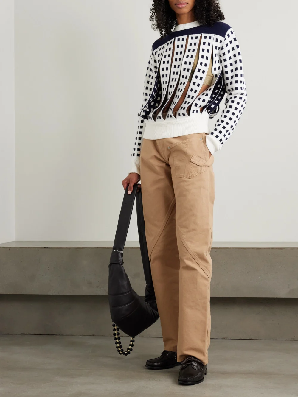 JW Anderson Cutout Jacquard-knit Sweater, worn by a model