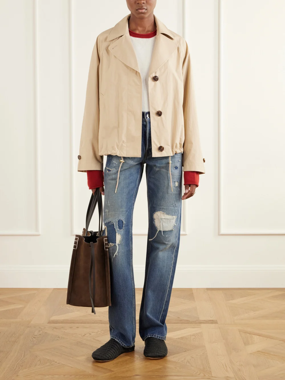JW Anderson Distressed Mid-rise Straight-leg Jeans, worn by a model