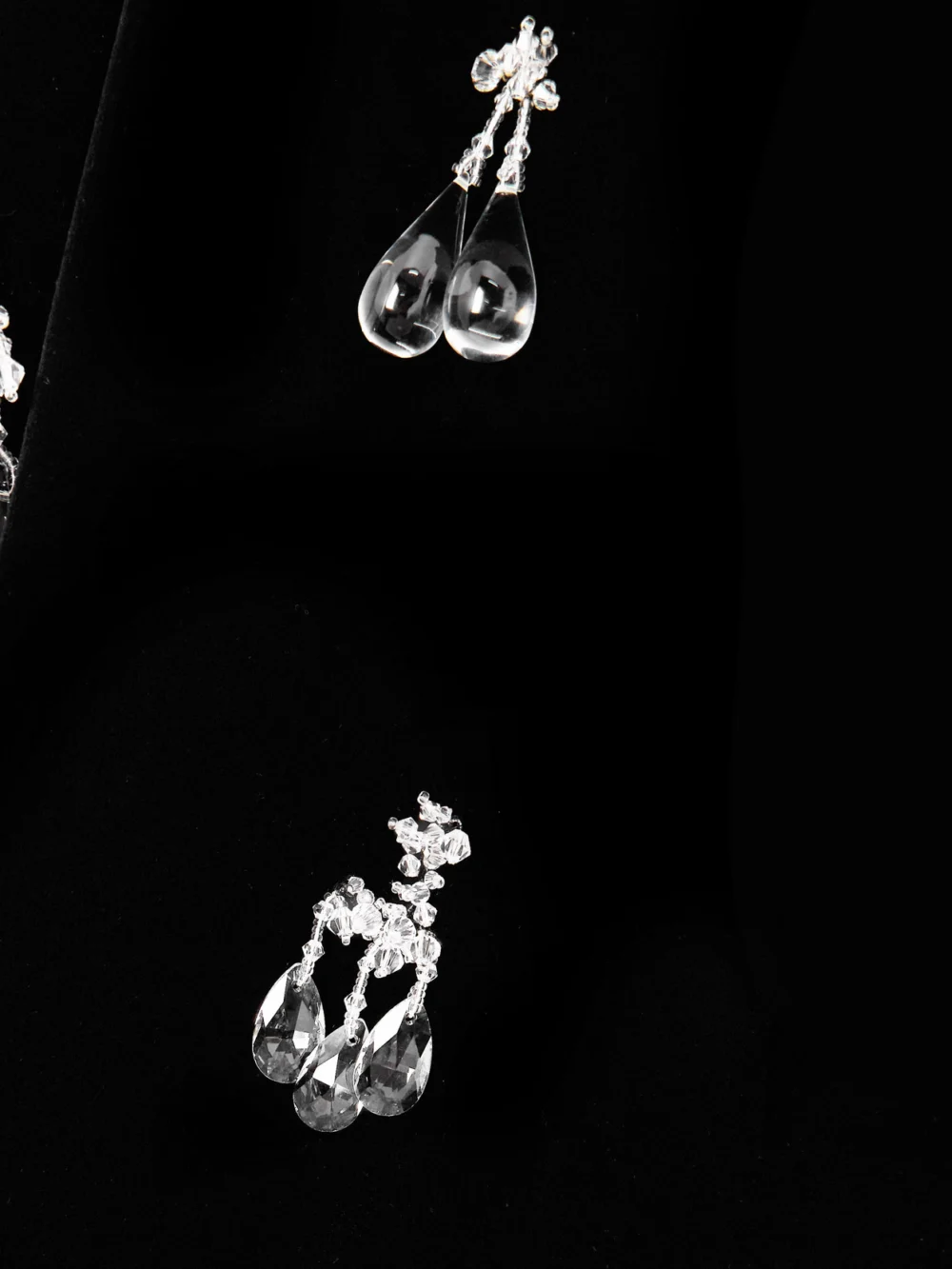 Close-up detail of the JW Anderson Embellished Padded Cotton-velvet Midi Dress
