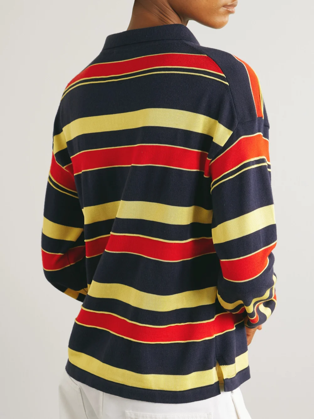 Back view of the JW Anderson Embroidered Striped Cotton and Wool-blend Polo Shirt