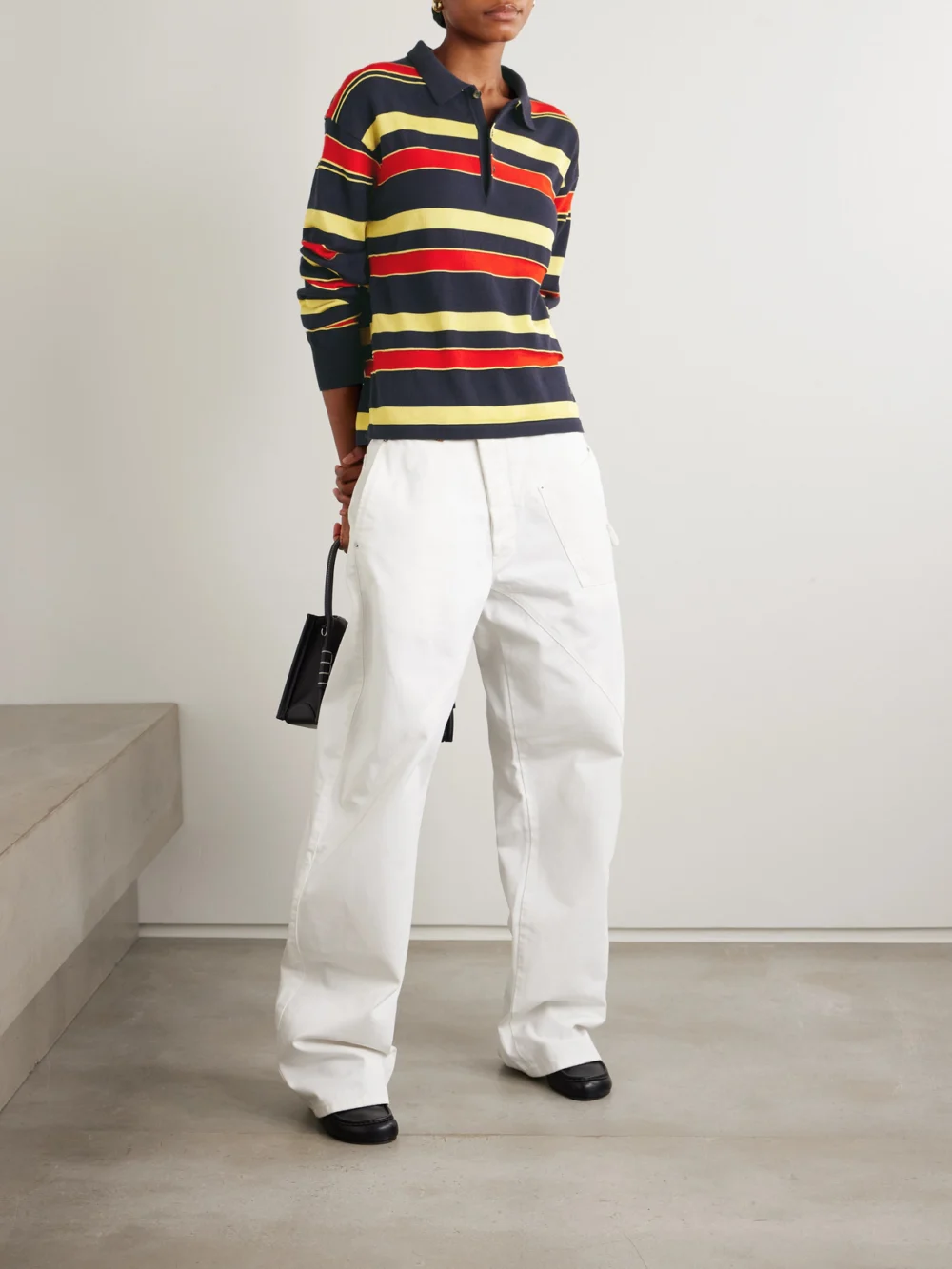 JW Anderson Embroidered Striped Cotton and Wool-blend Polo Shirt, worn by a model