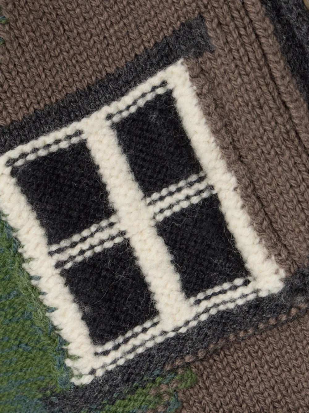Close-up detail of the JW Anderson House Embroidered Intarsia-knit Merino Wool Cardigan