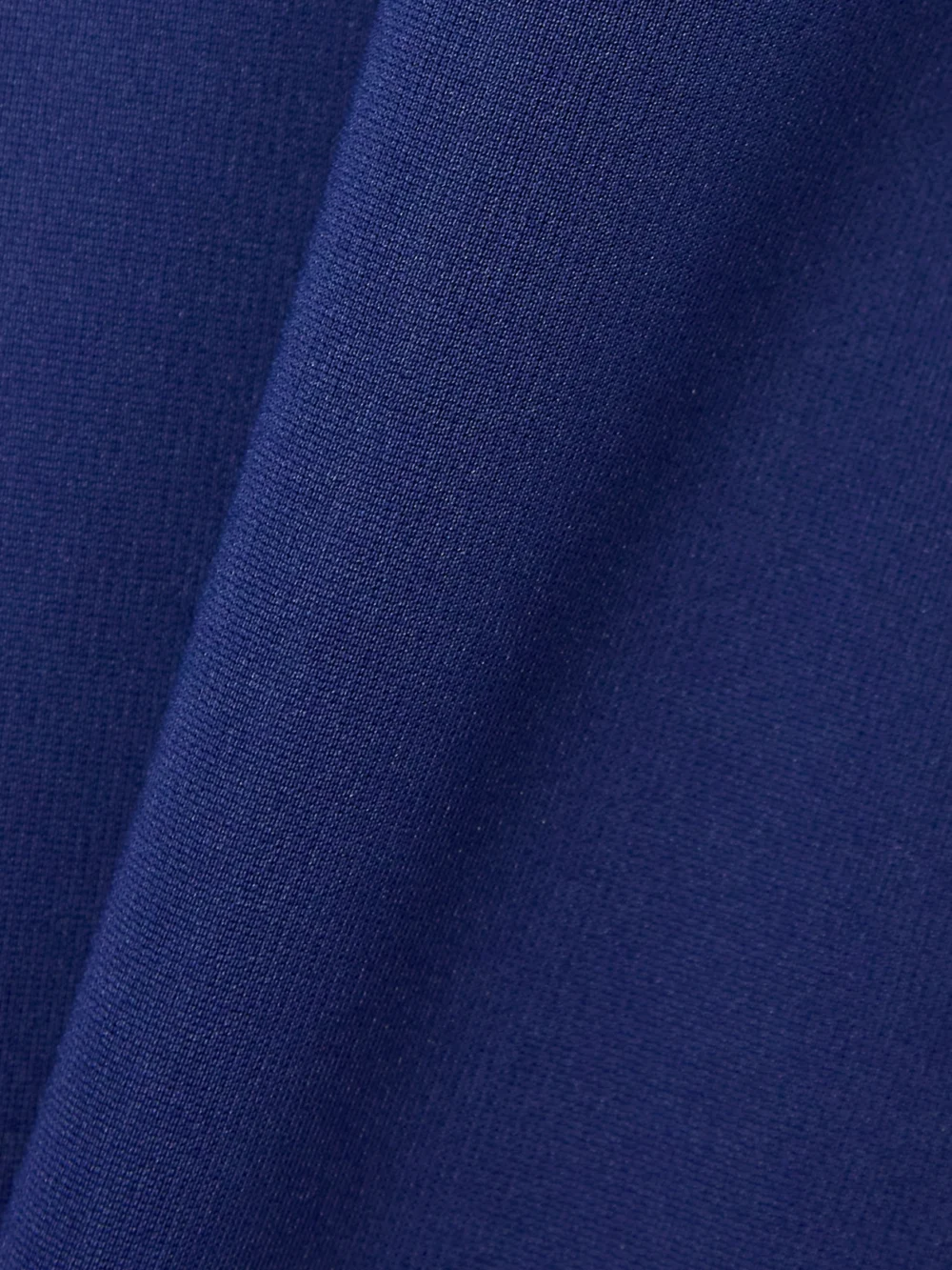 Close-up detail of the JW Anderson Layered Asymmetric Stretch-jersey Skirt