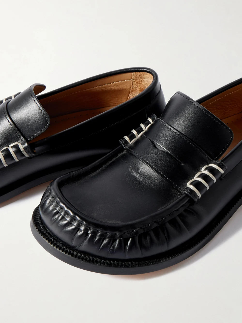 Close-up detail of the JW Anderson Leather Loafers