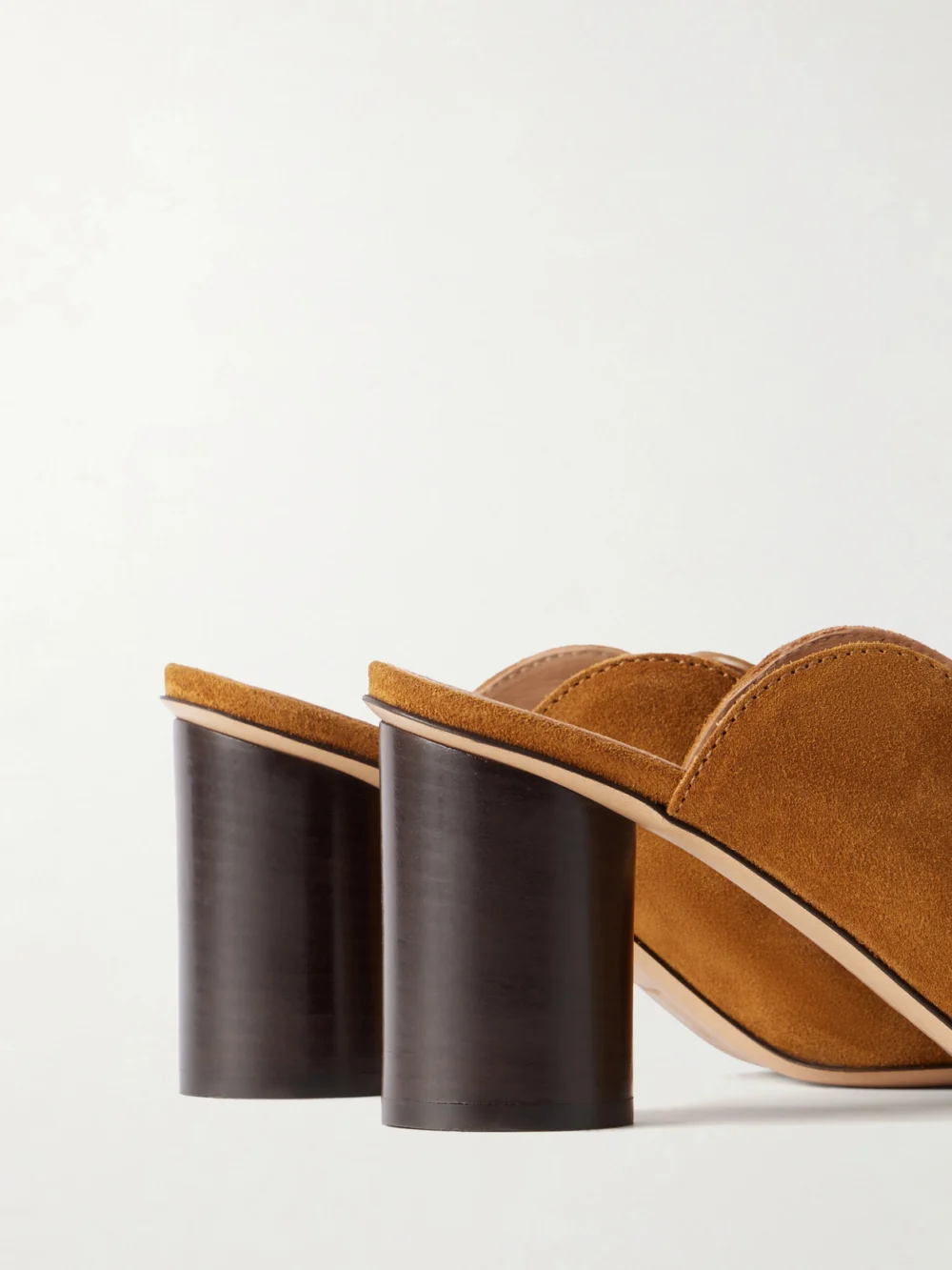 Close-up detail of the JW Anderson Leather-trimmed Suede Mules