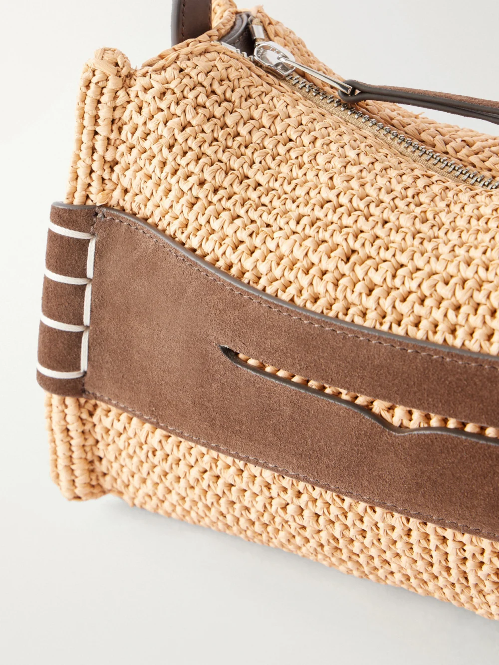 Close-up detail of the JW Anderson Loafer Crocheted Suede-trimmed Raffia Shoulder Bag
