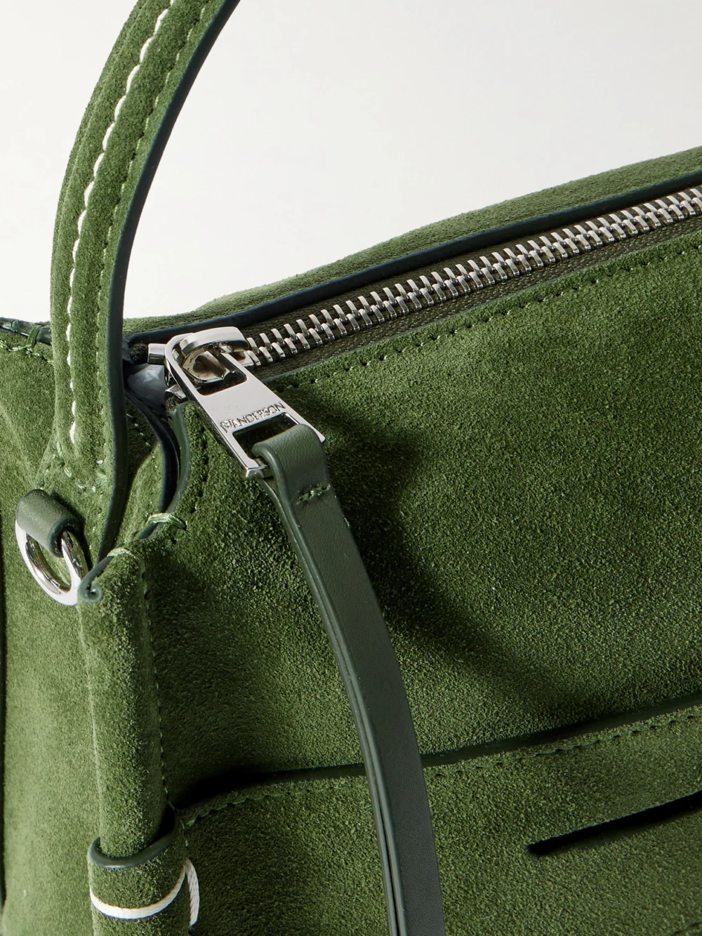 Close-up detail of the JW Anderson Loafer Embroidered Suede Shoulder Bag