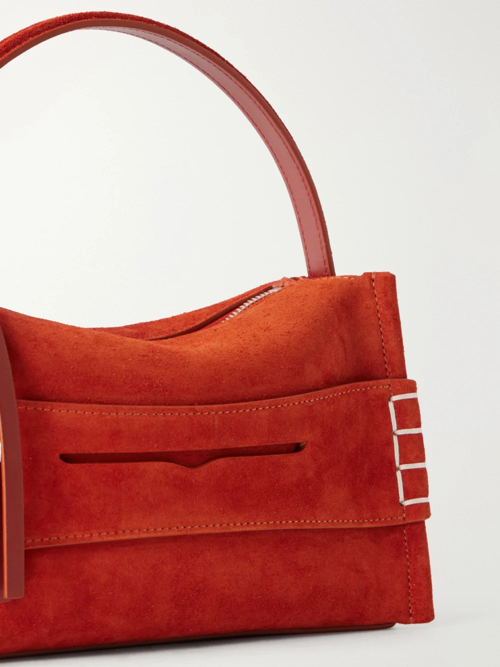 Close-up detail of the JW Anderson Loafer Small Suede Shoulder Bag