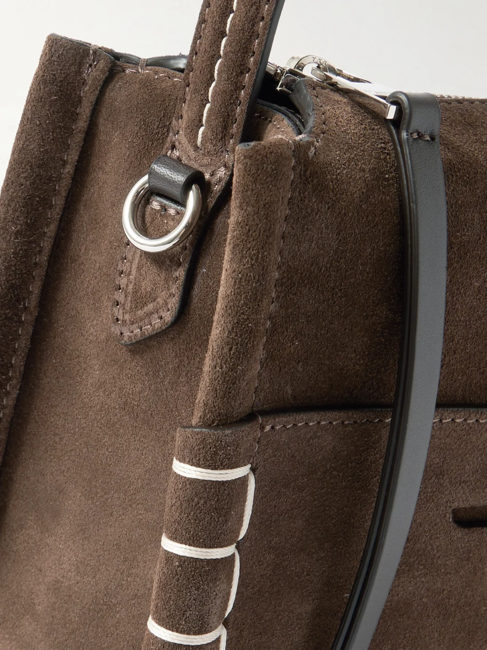 Close-up detail of the JW Anderson Loafer Suede Shoulder Bag