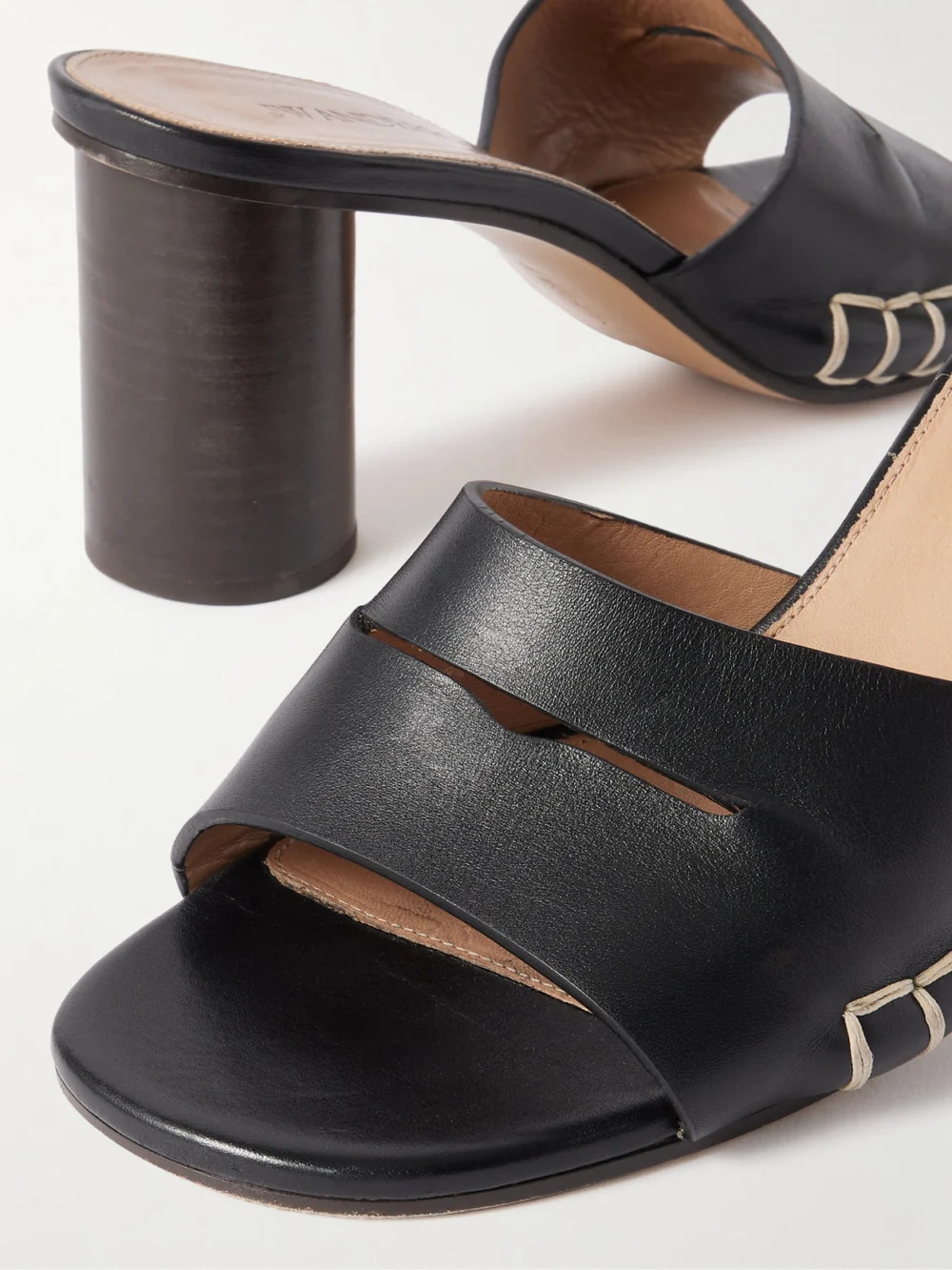 Close-up detail of the JW Anderson Loafer Whipstitched Leather Mules
