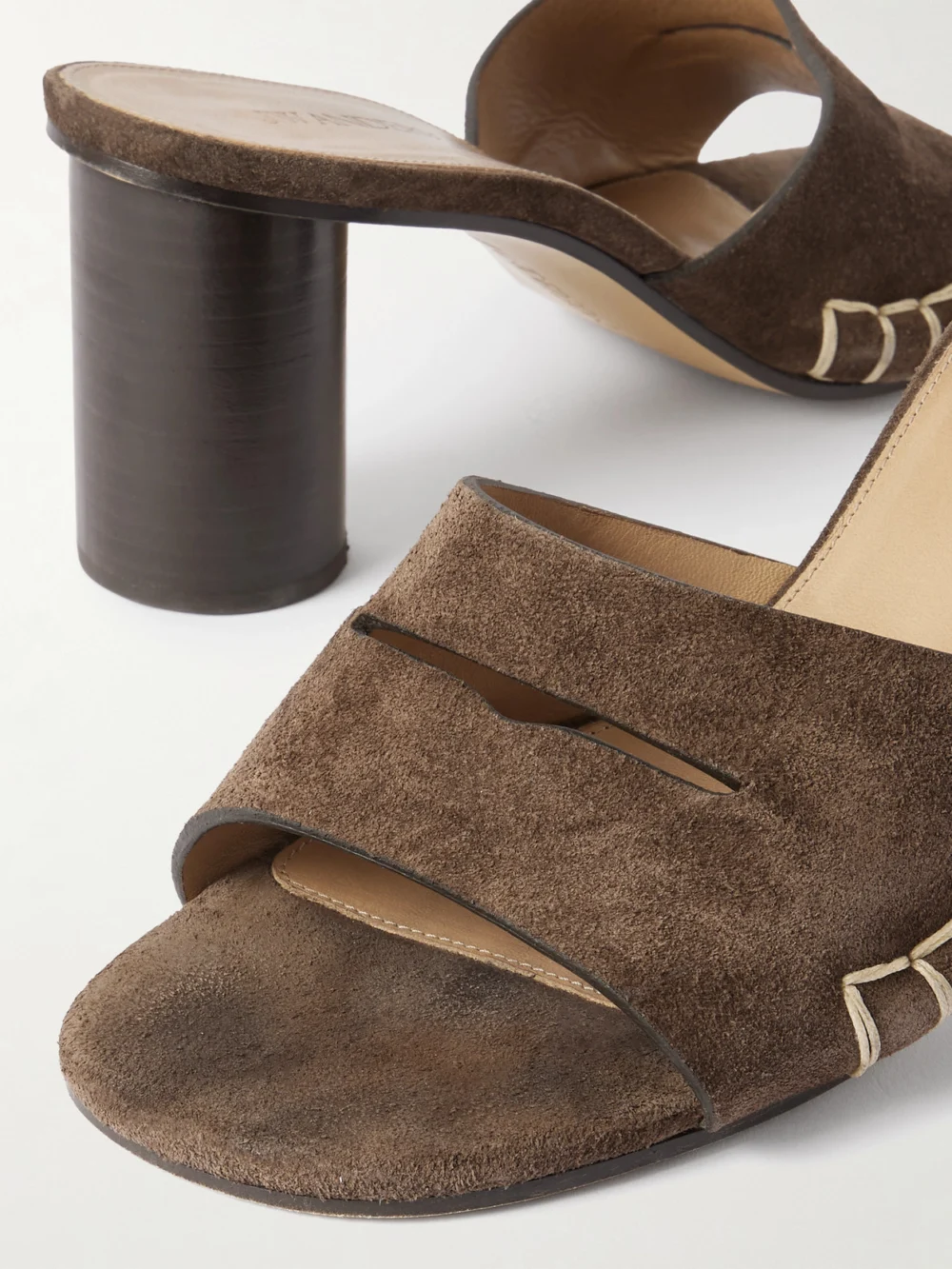 Close-up detail of the JW Anderson Loafer Whipstitched Suede Mules