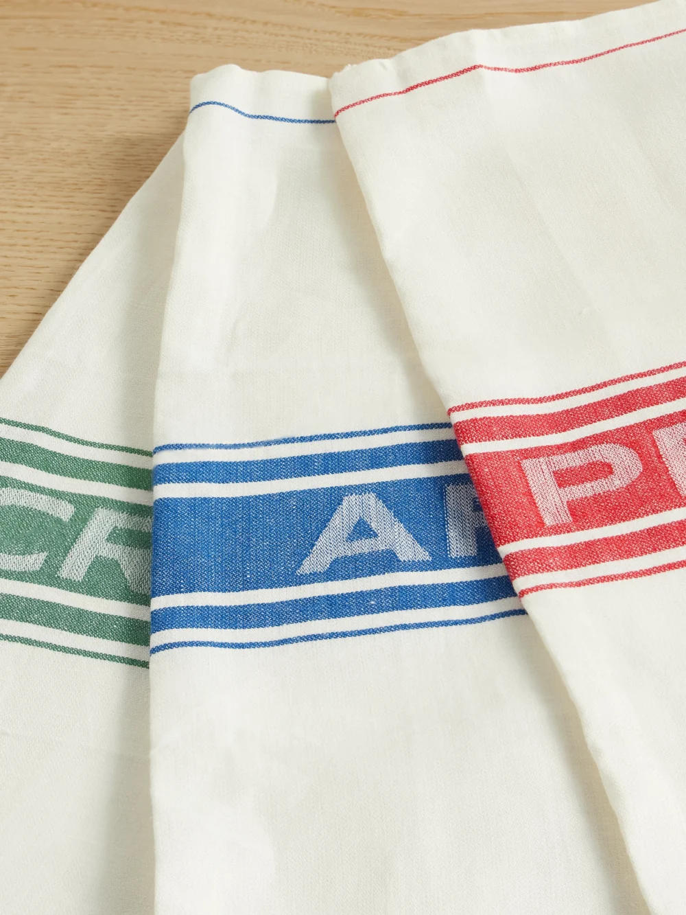 Close-up detail of the JW Anderson Neilly Set of Three Striped Linen Napkins