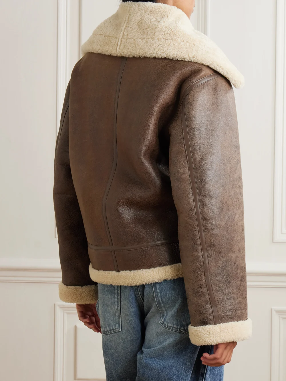 Back view of the JW Anderson Oversized Belted Shearling Jacket