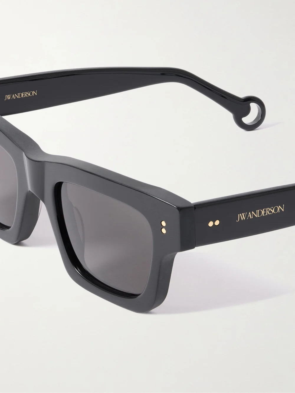 Close-up detail of the JW Anderson Rectangular-frame Acetate Sunglasses