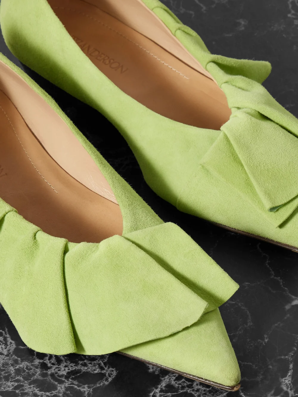 Close-up detail of the JW Anderson Ruffled Suede Ballet Flats