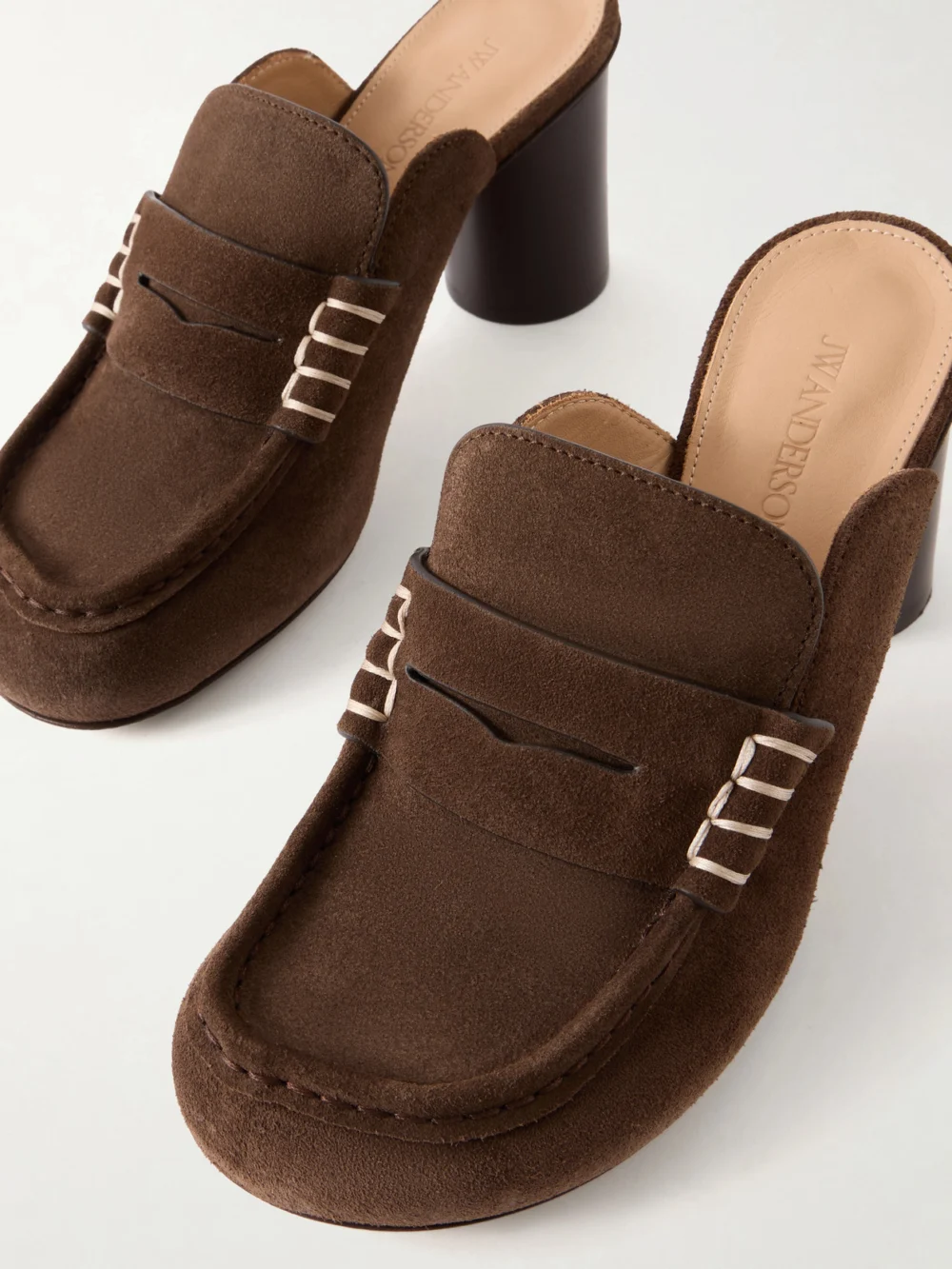 Close-up detail of the JW Anderson Suede Mule Pumps