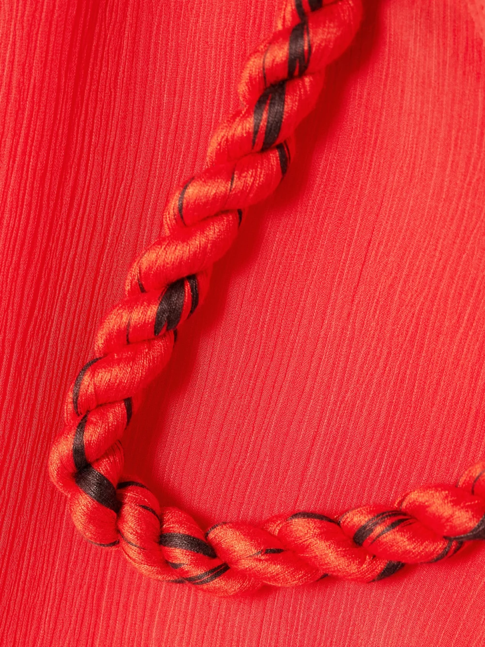 Close-up detail of the JW Anderson Tasseled Crepon Camisole