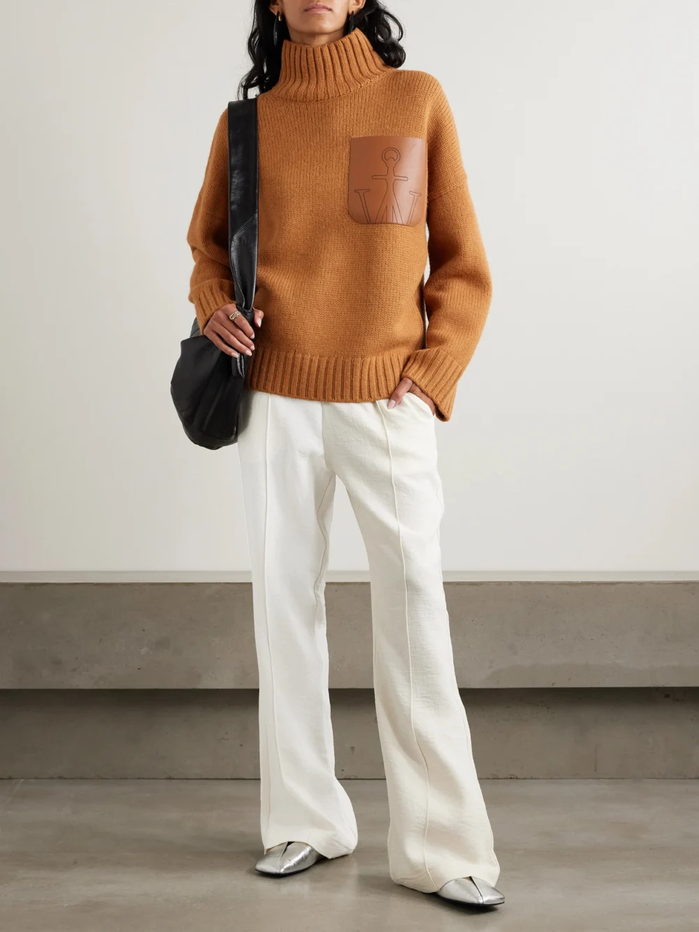 JW Anderson Tech-jersey Flared Track Pants, worn by a model
