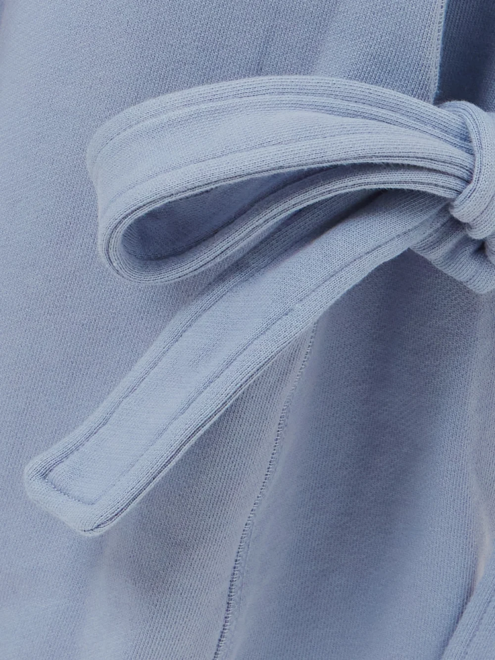 Close-up detail of the JW Anderson Tie-detailed Cotton-jersey Straight-leg Sweatpants