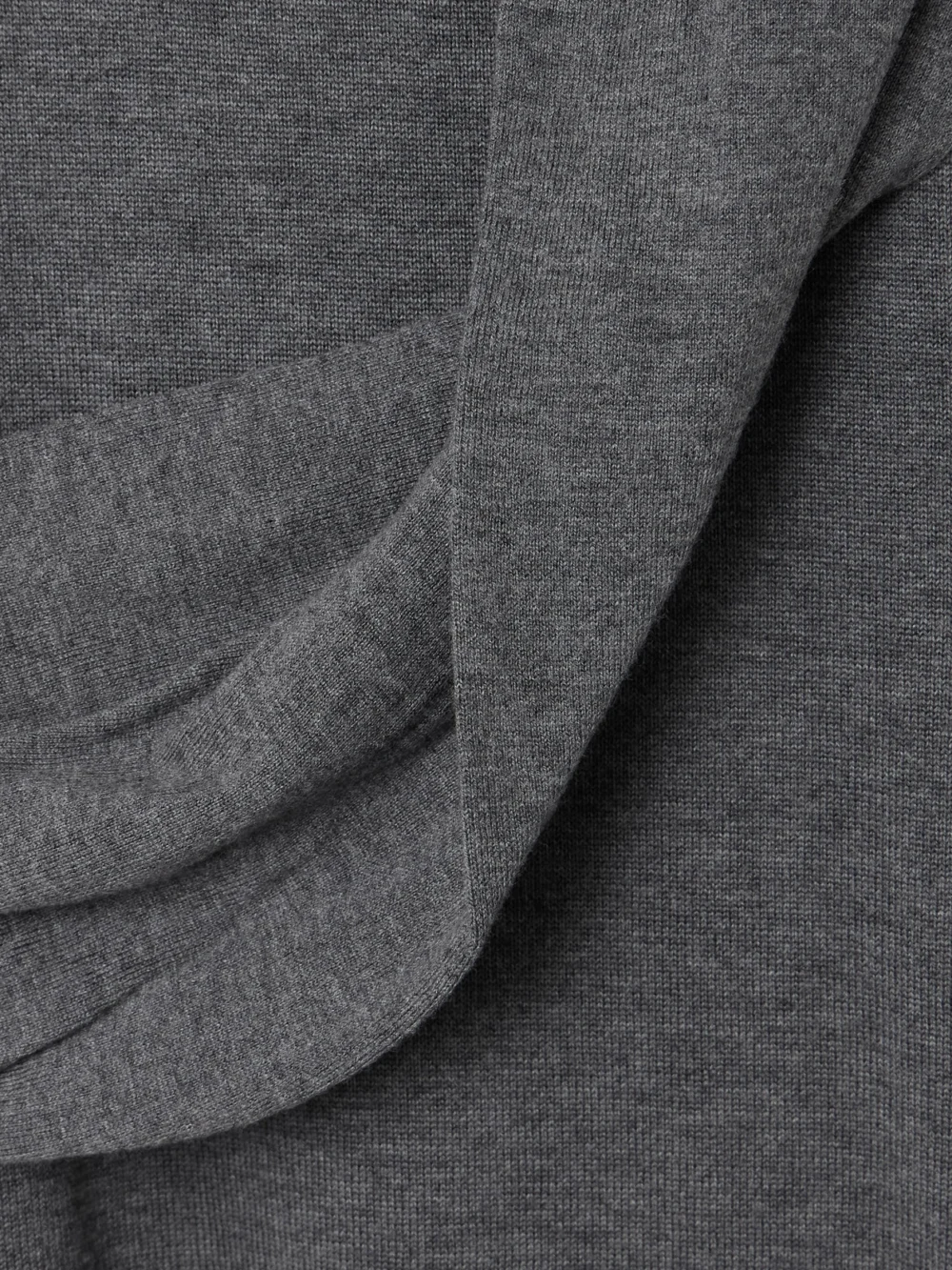 Close-up detail of the JW Anderson Tie-detailed Wrap-effect Knitted Maxi Dress