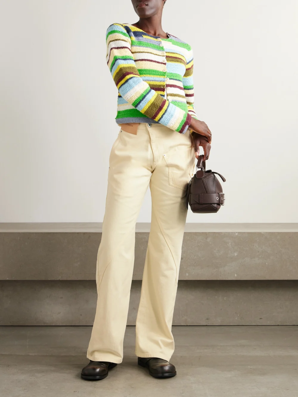 JW Anderson Twisted Low-rise Wide-leg Jeans, worn by a model