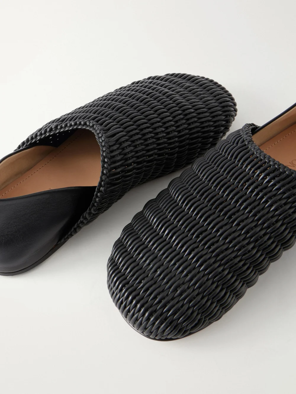 Close-up detail of the JW Anderson Woven Leather Mules