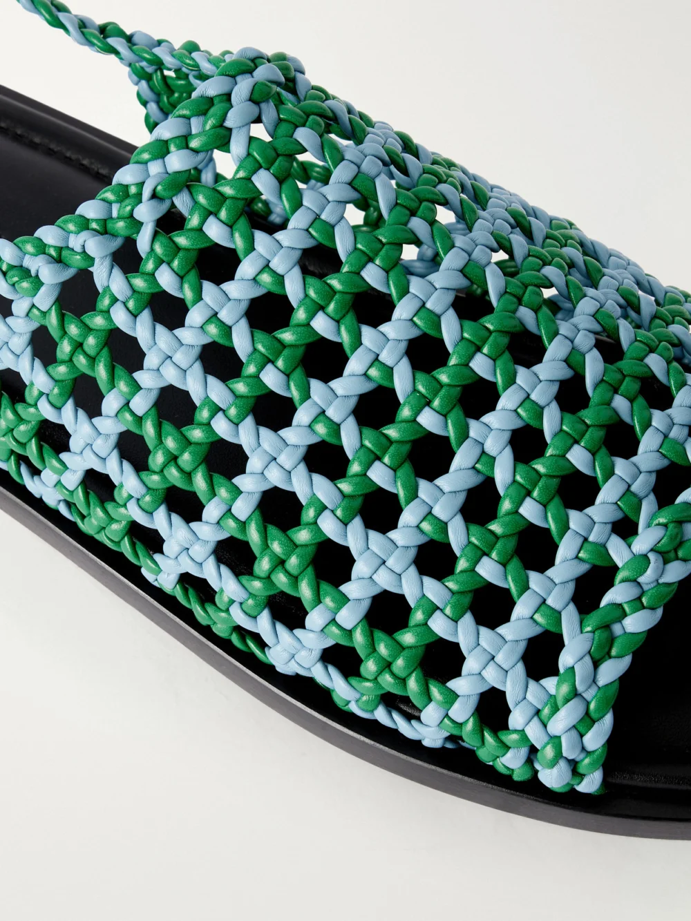 Close-up detail of the JW Anderson Woven Leather Sandals