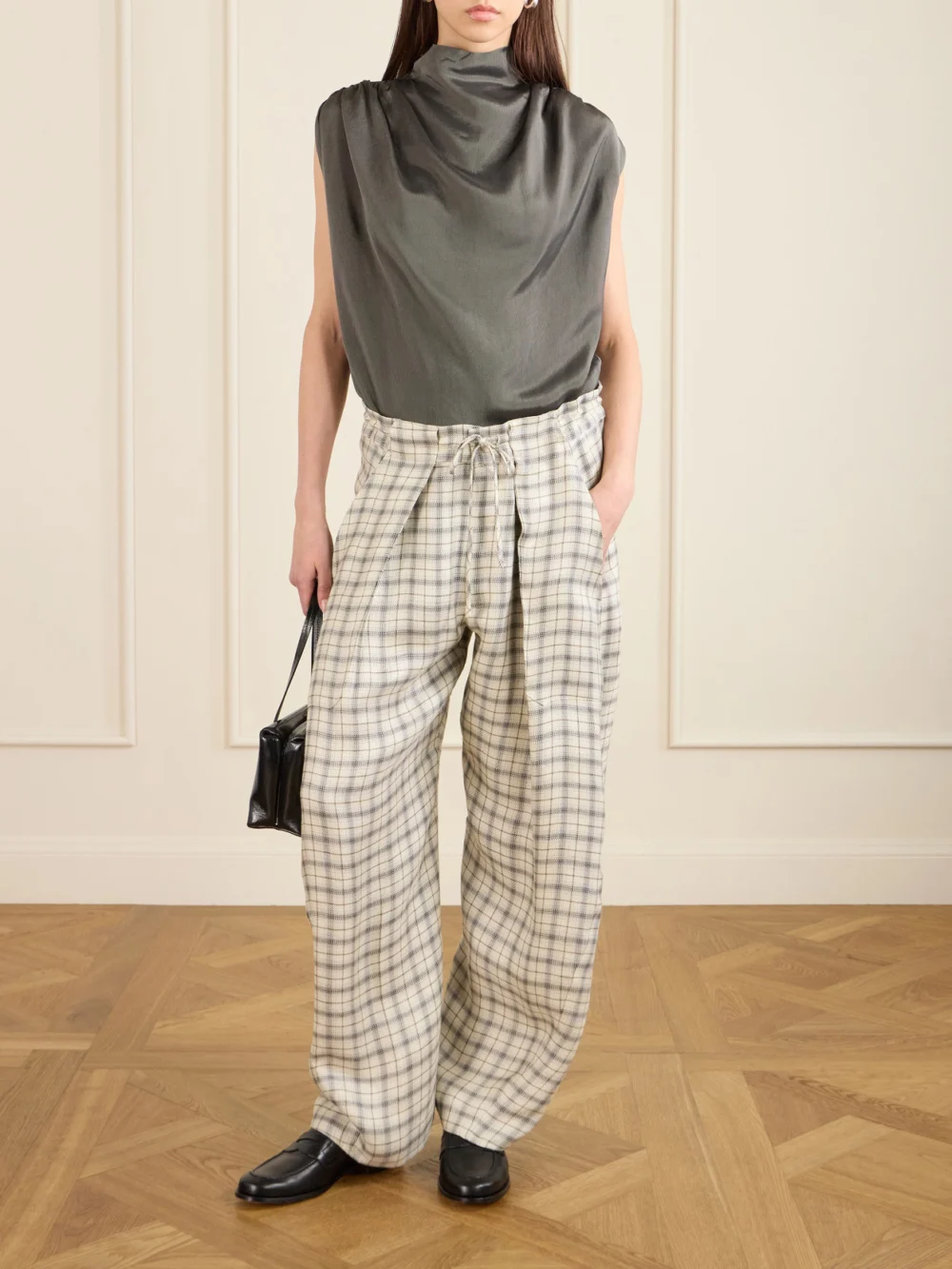 Kallmeyer Clemence Pleated Checked Linen-blend Pants, worn by a model