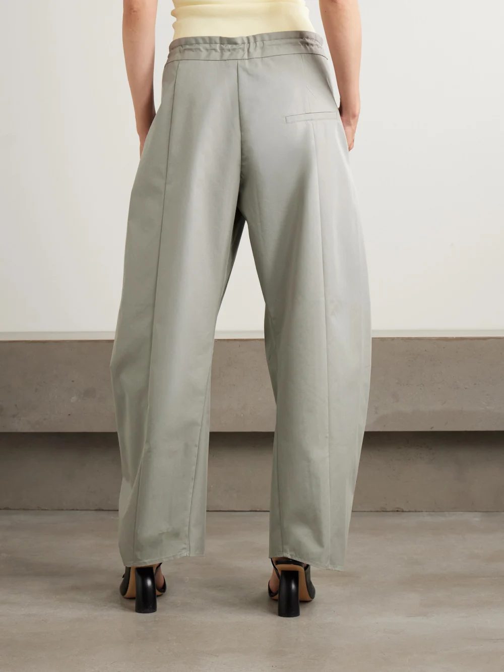 Back view of the Kallmeyer Clemence Pleated Cotton-blend Twill Barrel-leg Pants
