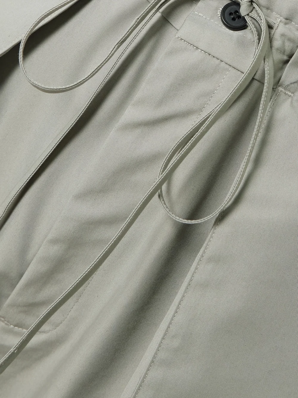 Close-up detail of the Kallmeyer Clemence Pleated Cotton-blend Twill Barrel-leg Pants