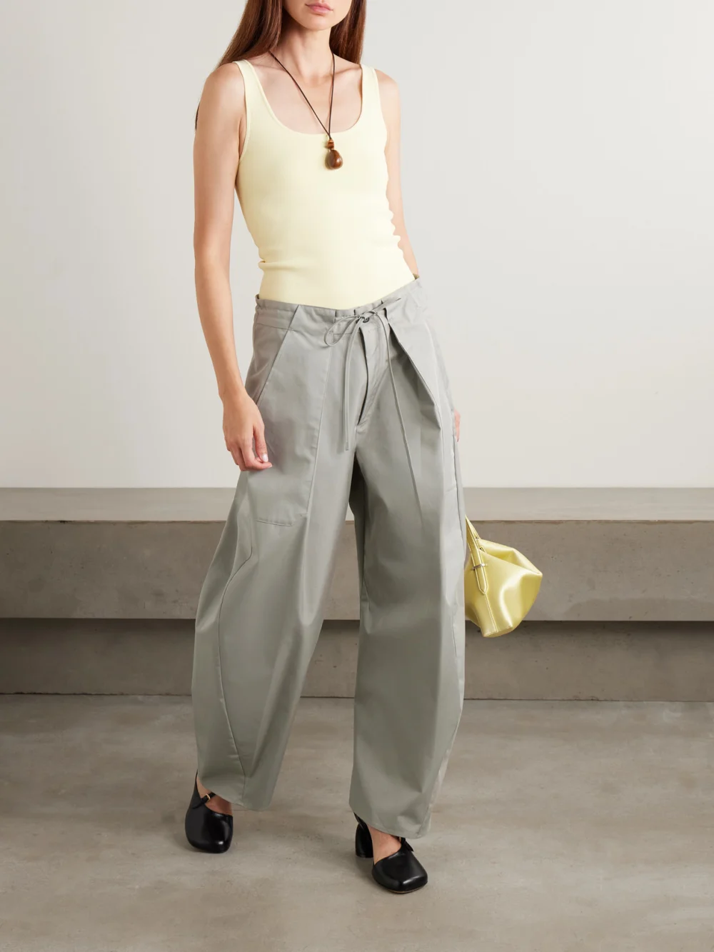 Kallmeyer Clemence Pleated Cotton-blend Twill Barrel-leg Pants, worn by a model