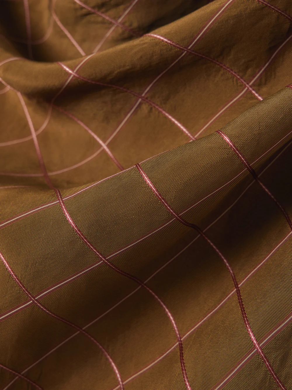 Close-up detail of the Kallmeyer Naia Checked Draped Voile Top