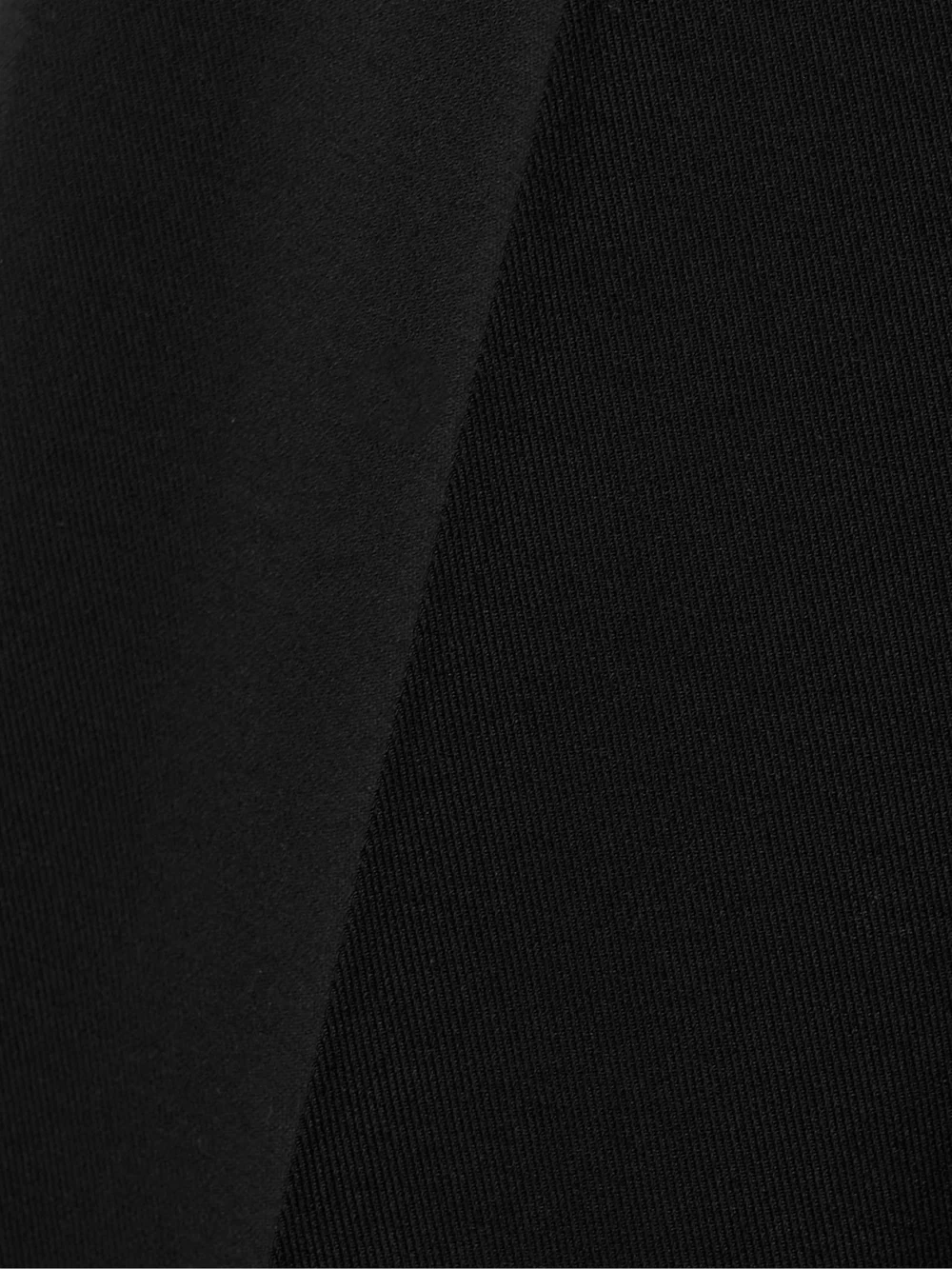 Close-up detail of the Kallmeyer Phoebe Wool-crepe Straight-leg Pants