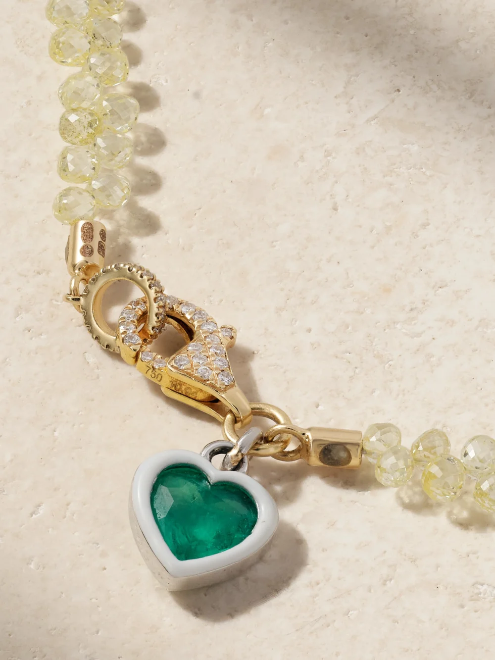 Back view of the Kamyen 18-karat Yellow and White Gold, Diamond and Emerald Bracelet