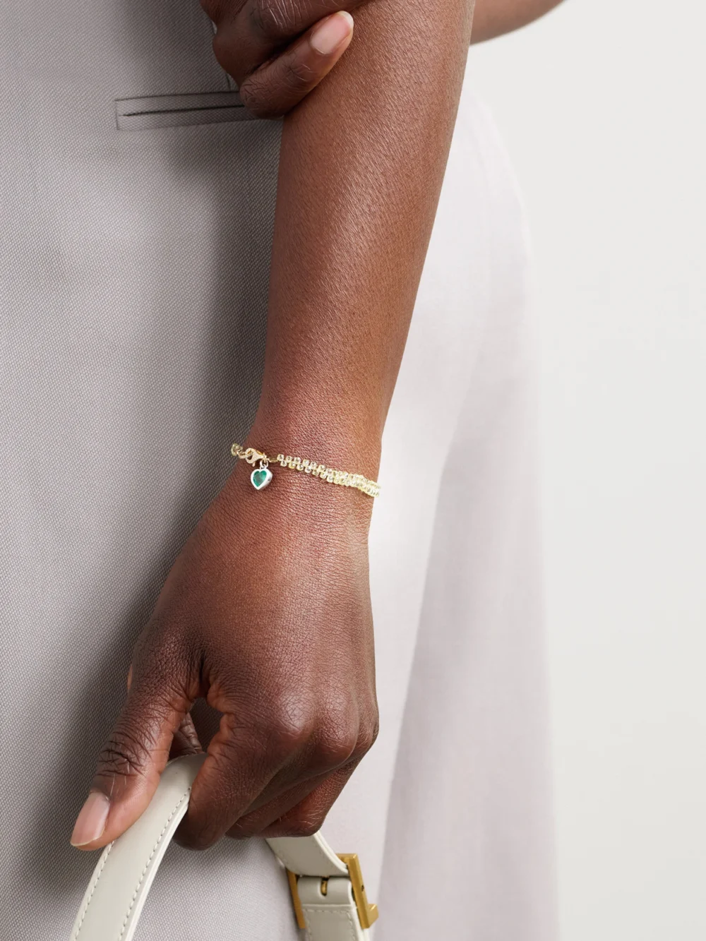 Kamyen 18-karat Yellow and White Gold, Diamond and Emerald Bracelet, styled view