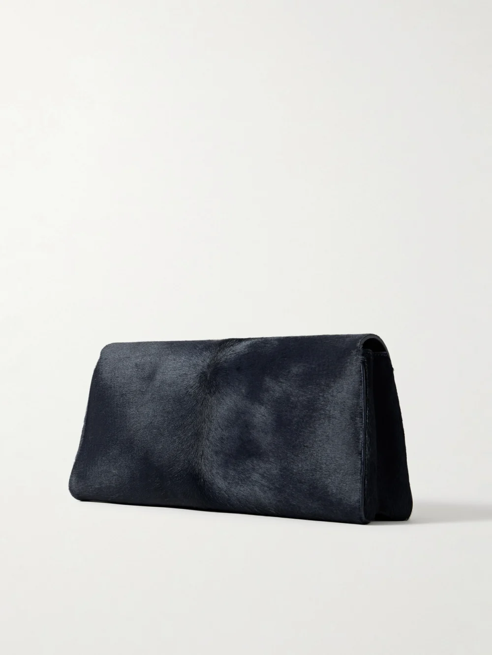 Back view of the Khaite Audrey Calf Hair Clutch