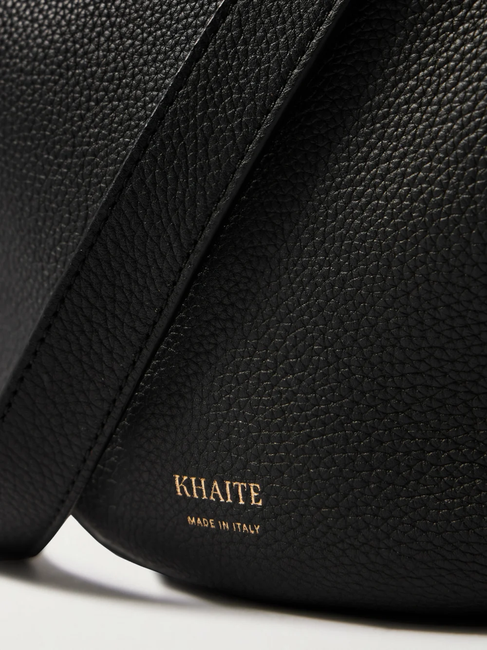 Close-up detail of the Khaite Augustina Small Textured-leather Shoulder Bag
