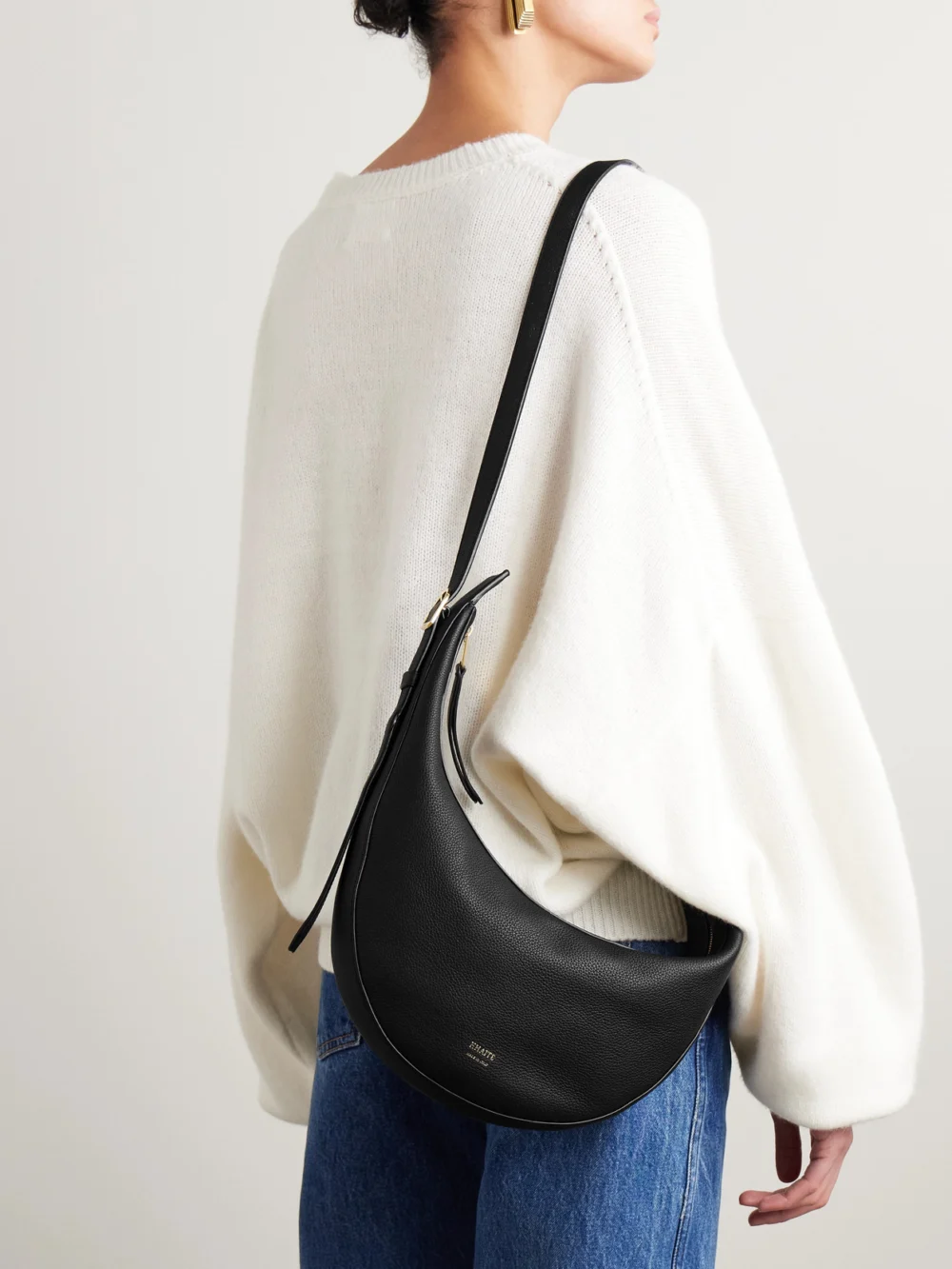 Khaite Augustina Small Textured-leather Shoulder Bag, styled view