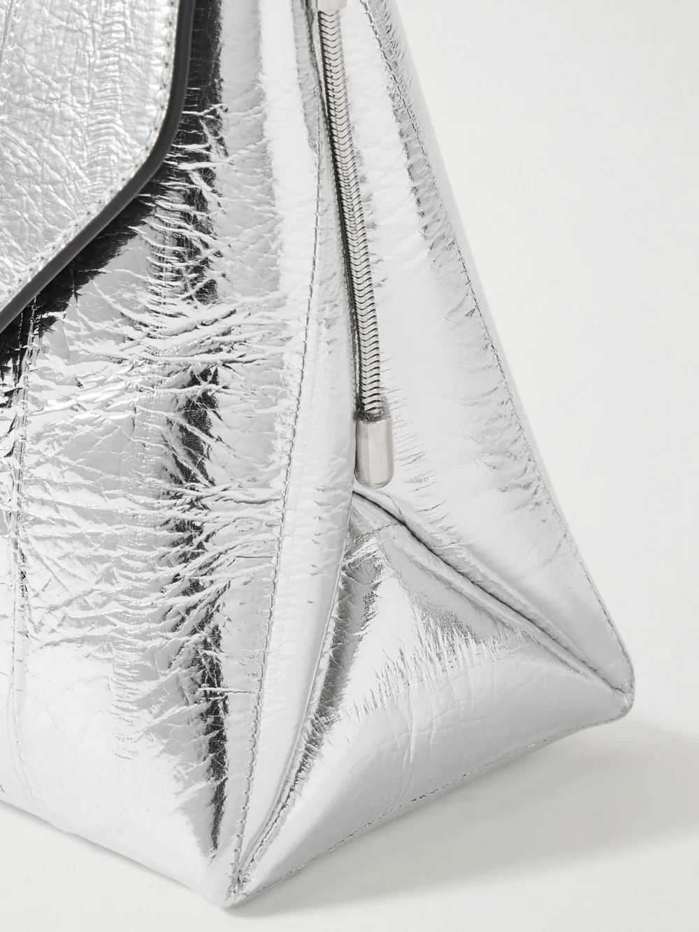 Close-up detail of the Khaite Bobbi Metallic Eel Shoulder Bag