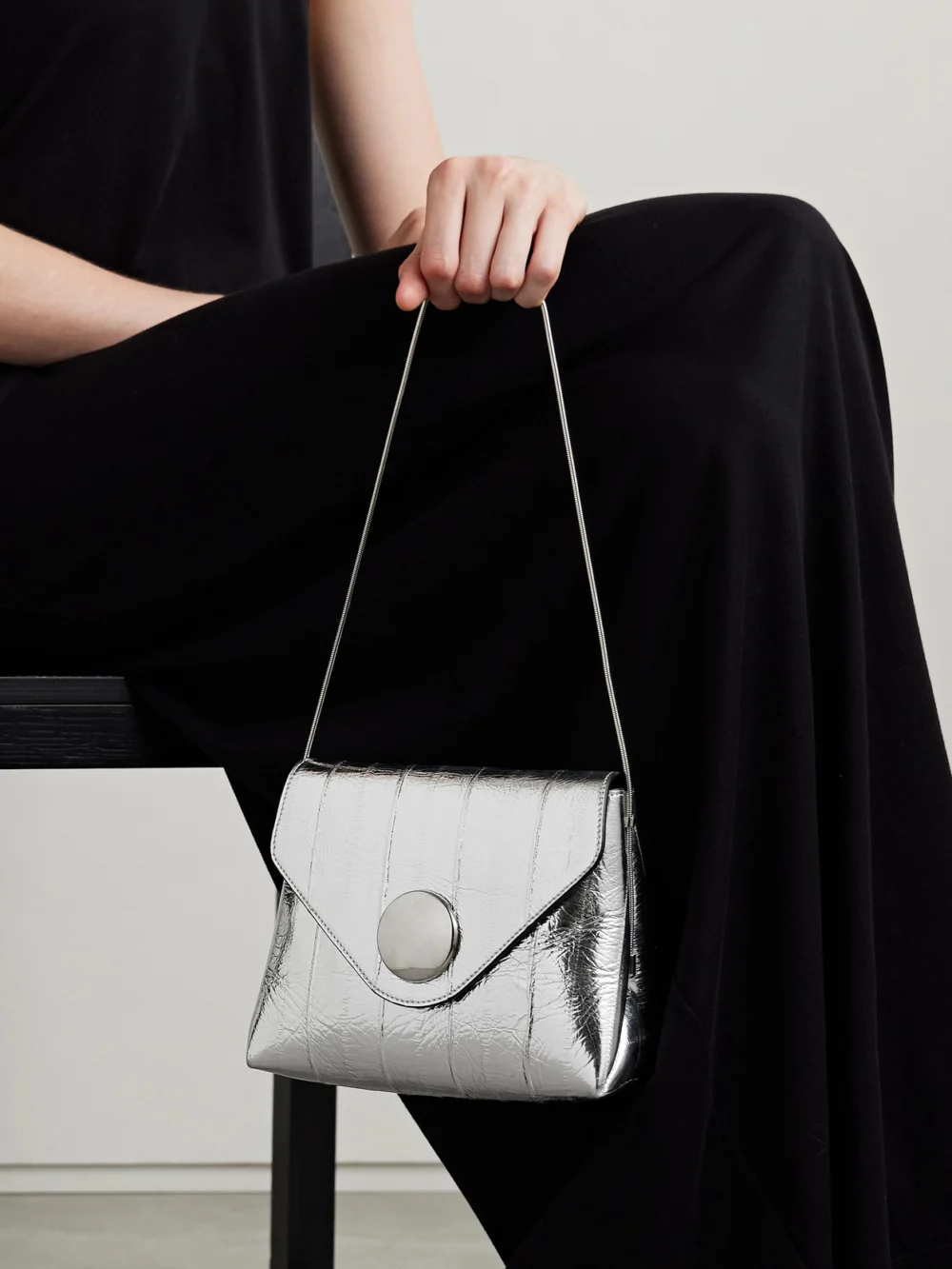 Khaite Bobbi Metallic Eel Shoulder Bag, styled view